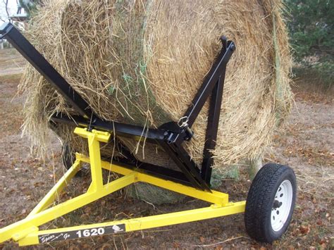 tow behind round bale unroller